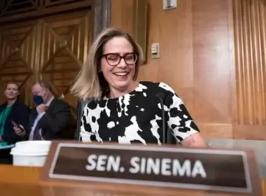 Sen. Kyrsten Sinema, D-Ariz., arrives for a meeting of the Senate Homeland Security Committee at the Capitol in Washington, Wednesday, Aug. 3, 2022. AP