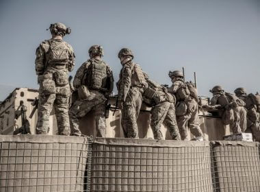 U.S. service members assist with security at an Evacuation Control Check Point (ECC) during an evacuation at Hamid Karzai International Airport, Kabul, Afghanistan, August 26, 2021. U.S. Marine Corps/Staff Sgt. Victor Mancilla/Handout via REUTERS.