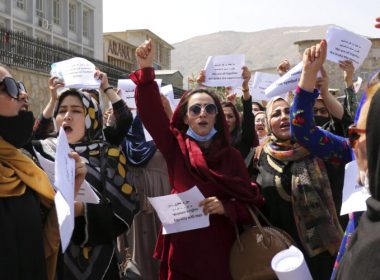 Women gather to demand their rights under the Taliban rule during a protest in Kabul, Afghanistan. AP