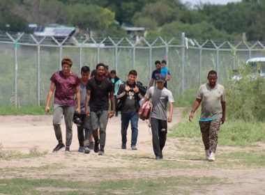 With no Border Patrol agents available, a group of migrants surrenders to Texas National Guard soldiers. (Randy Clark/Breitbart Texas)
