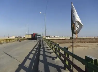 In this photo taken on February 18, 2022 a truck is seen on the Iran side at the zero point of Afghan-Iran border crossing bridge in Zaranj, Afghanistan. AFP