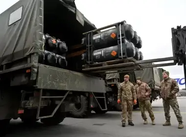 Ukrainian servicemen load a truck with the FGM-148 Javelin, American man-portable anti-tank missile provided by US to Ukraine as part of a military support, upon its delivery at Kyiv's airport Boryspil on February 11,2022, amid the crisis linked with the threat of Russia's invasion. (Photo by Sergei SUPINSKY / AFP) (Photo by SERGEI SUPINSKY/AFP via Getty Images)