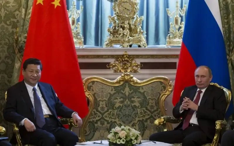 Russian President Vladimir Putin and Chinese President Xi Jinping meet in the Kremlin in Moscow. (AP Photo/Alexander Zemlianichenko)