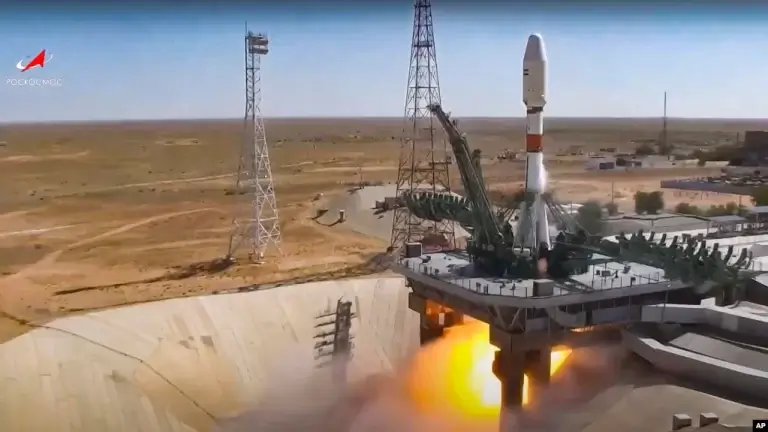A Russian Soyuz rocket lifts off from the Baikonur Cosmodrome in Kazakhstan on August 9, carrying an Iranian Khayyam satellite into orbit. AP
