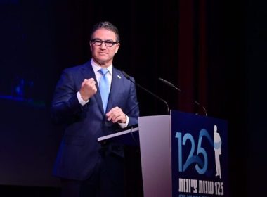 Former Mossad chief Yossi Cohen speaks at an event in Switzerland marking 125 years since the First Zionist Congress, August 29, 2022. (Yossi Zeliger)