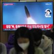 A TV screen shows a file image of North Korea's missile launch during a news program at the Seoul Railway Station in Seoul, South Korea, Thursday, Sept. 29, 2022. AP