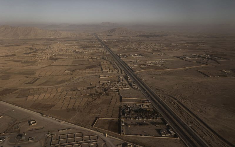 The road connecting Spin Boldak, a town and border crossing with Pakistan, to Kandahar, Afghanistan. February 1, 2021. (Jim Huylebroek/The New York Times)