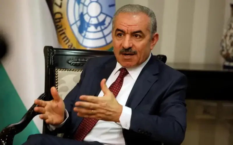 Palestinian Prime Minister Mohammad Shtayyeh gestures during an interview with Reuters in his office in Ramallah, in the Israeli-occupied West Bank, June 27, 2019 (photo credit: RANEEN SAWAFTA/ REUTERS)