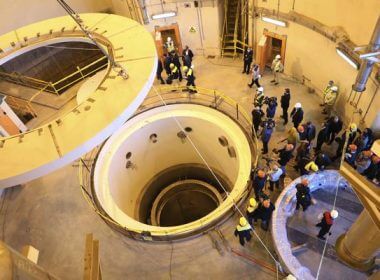 In this photo released by the Atomic Energy Organization of Iran, technicians work at the Arak heavy water reactor's secondary circuit, as officials and media visit the site, near Arak, Iran, Dec. 23, 2019.