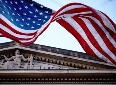 An American flag flies outside the Department of Justice in Washington, March 22, 2019. AP