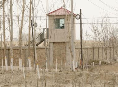 A security guard watches from a tower around a detention facility in Yarkent County in northwestern China's Xinjiang Uyghur Autonomous Region on March 21, 2021. AP