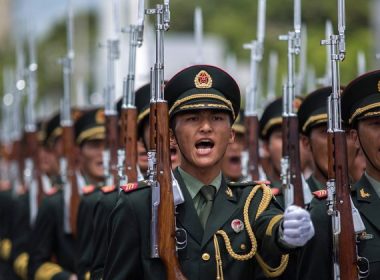 China's Peoples' Liberation Army soldiers march at the Ngong Shuen Chau Barracks in Hong Kong on July 1, 2013. (Lam Yik Fei/Getty Images)