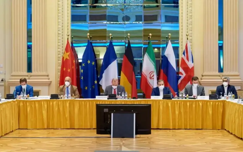 European External Action Service (EEAS) Deputy Secretary General Enrique Mora and Iranian Deputy at Ministry of Foreign Affairs Abbas Araghchi wait for the start of talks on reviving the 2015 Iran nuclear deal in Vienna, Austria June 20, 2021 (credit: REUTERS)
