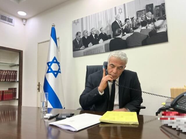 Israeli Prime Minister Yair Lapid talks on the phone with US President Joe Biden, August 31, 2022.