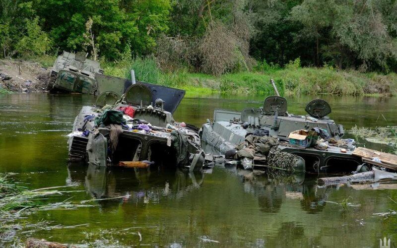 Armoured fighting vehicles abandoned by Russian soldiers are seen during a counteroffensive operation of the Ukrainian Armed Forces, amid Russia's attack on Ukraine, in Kharkiv region, Ukraine, in this handout picture released September 11, 2022. Press service of the Commander-in-Chief of the Armed Forces of Ukraine/Handout via REUTERS