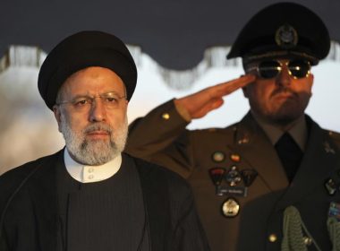 Iranian President Ebrahim Raisi reviews an honor guard during his official departure ceremony as he leaves Tehran's Mehrabad airport to New York to attend annual UN General Assembly meeting, early Monday, Sept. 19, 2022. AP