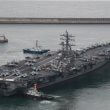 USS Ronald Reagan, a U.S. Navy Nimitz-class nuclear-powered aircraft carrier, departs from the South Korean Fleet Command in Busan, Monday, for combined drills with the South Korean Navy. The two allies have begun their biggest naval exercise in five years in response to North Korea's intensifying nuclear threat. Yonhap