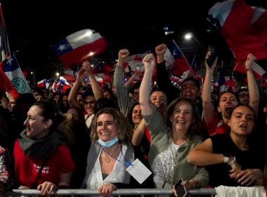 Opponents of the new Constitution celebrate in the streets the results of a plebiscite on whether the new Constitution will replace the current Magna Carta imposed by a military dictatorship 41 years ago, in Santiago, Chile, Sept. 4, 2022.