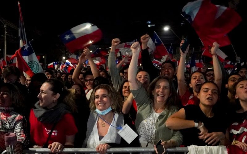 Opponents of the new Constitution celebrate in the streets the results of a plebiscite on whether the new Constitution will replace the current Magna Carta imposed by a military dictatorship 41 years ago, in Santiago, Chile, Sept. 4, 2022.