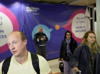 Vladimir, a passenger from the Moscow-Belgrade flight operated by Air Serbia, speaks to the media at the airport in Belgrade, Serbia, Wednesday, Sept. 21, 2022. AP