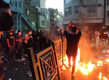 People light a fire during a protest over the death of Mahsa Amini, a woman who died after being arrested by the Islamic republic’s “morality police”, in Tehran, Iran September 21, 2022. Photo: WANA (West Asia News Agency) via REUTERS