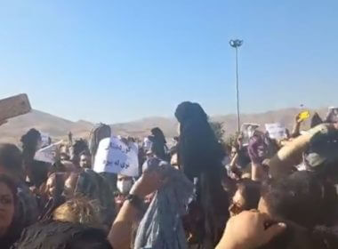 A screenshot of video circulating on social media purports to show women in Saqez, Iran, removing their headscarves in protest against the death of 22-year-old Mahsa Amini, who died after being detained by morality police enforcing strict hijab rules. Social Media