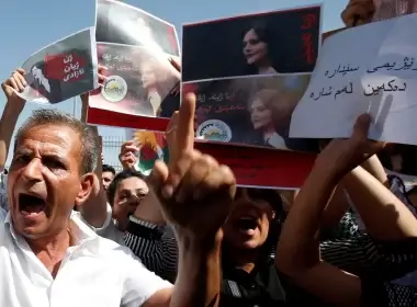 People take part in a protest following the death of Mahsa Amini in front of the United Nations headquarters in Erbil, Iraq, Sept. 24, 2022. (Photo: REUTERS/Azad Lashkari)