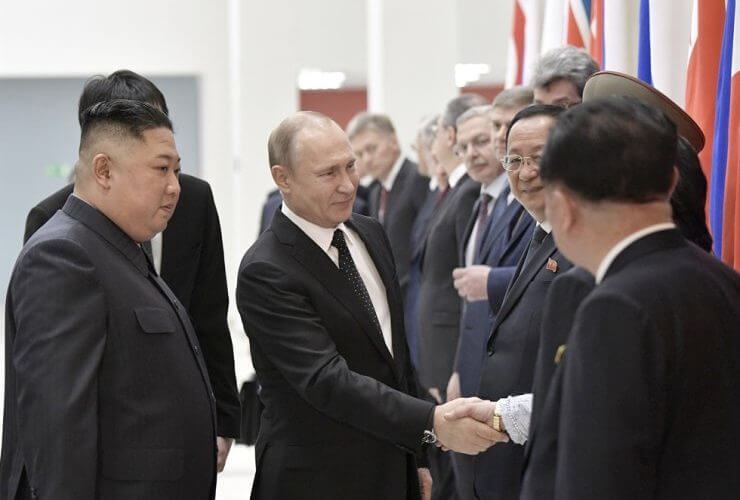 Russian President Vladimir Putin, second left, greets North Korea's delegation prior to his talks with North Korean leader Kim Jong-un, left, in Vladivostok, in this April 25, 2019, file photo. AP-Yonhap