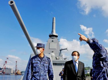 Japanese Minister of Defense Yasukazu Hamada, center, inspects the stealth-capable Mogami at the Japan Maritime Self-Defense Force base in Yokosuka, Japan, on Monday. Photo: Reuters