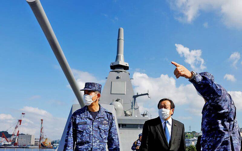 Japanese Minister of Defense Yasukazu Hamada, center, inspects the stealth-capable Mogami at the Japan Maritime Self-Defense Force base in Yokosuka, Japan, on Monday. Photo: Reuters
