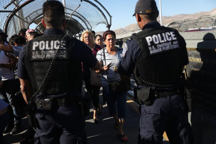 U.S. Border Patrol agents check passports at the Paso Del Norte Port of Entry, where the U.S. and Mexico border meet. (Getty images