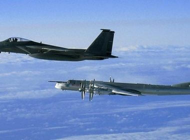 Illustrative photo of an American F-15 intercepting a Russian Tu-95 Bear Bomber during a Russian exercise near the west coast of Alaska in 2008. (US Air Force/Wikimedia Commons)