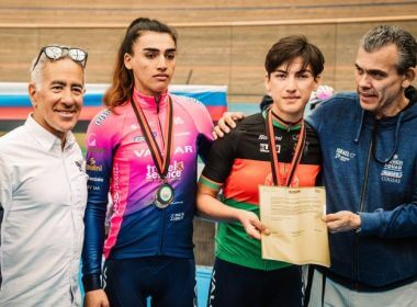 Afghanistan's national cycling champion Fariba Hashimi (2R) and her older sister Yulduz (2L) receive their contracts from the owner of Women’s WorldTour team Israel – Premier Tech Roland, Sylvan Adams, in Aigle, Switzerland, Oct. 23, 2022. (Photo: Israel – Premier Tech/Twitter)