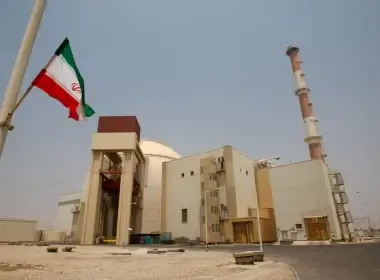 An Iranian flag flutters in front of the reactor building of the Bushehr nuclear power plant, just outside the southern city of Bushehr, Iran. AP