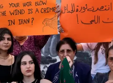 Kurdish women activists hold up placards during a protest against the death of Iranian Mahsa Amini in Iran, at Martyrs' Square in downtown Beirut, Lebanon, Wednesday, Sept. 21, 2022. (AP Photo/Bilal Hussein)