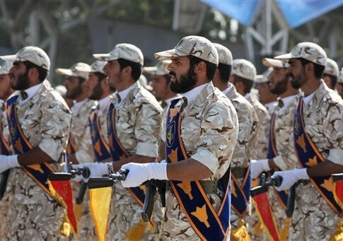 Members of Iran's Revolutionary Guard march / AP