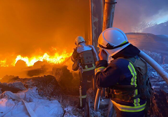 Firefighters conduct work in a damaged building. Photo by State Emergency Service of Ukraine /UPI
