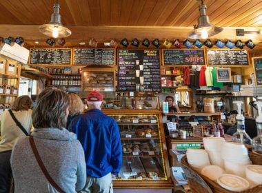 Customers are lined up for pastries, sandwiches, and specialty coffees at Pie In The Sky Bakery in Woods Hole, Mass. Rosemarie Mosteller / Shutterstock.com