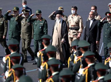 In this picture released by the official website of the office of the Iranian supreme leader, Supreme Leader Ayatollah Ali Khamenei, center, reviews a group of armed forces cadets during their graduation ceremony accompanied by commanders of the armed forces, at the police academy in Tehran, Iran, Monday, Oct. 3, 2022. AP