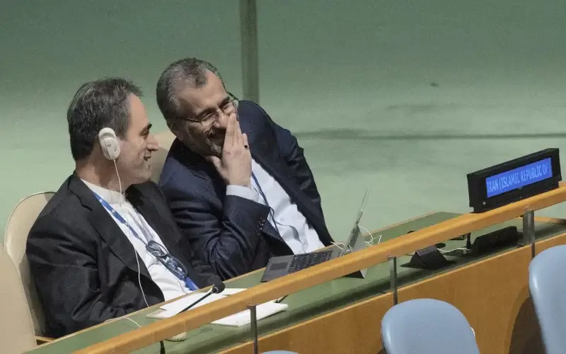 Iran's delegates look at each other while U.S. Secretary of State Antony J. Blinken addresses the 2022 Nuclear Non-Proliferation Treaty (NPT) review conference, in the United Nations General Assembly, Aug. 1, 2022. (AP Photo/Yuki Iwamura, File)