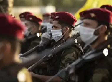 Members of the Hashed al-Shaabi (Popular Mobilisation) paramilitary force take part in a military parade in the southern Iraqi city of Basra on June 14, 2020. AFP