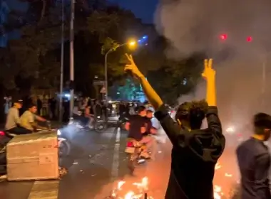 A man gestures during a protest over the death of Mahsa Amini, a woman who died after being arrested by the Islamic republic's "morality police", in Tehran, Iran September 19, 2022. (photo credit: WANA (WEST ASIA NEWS AGENCY) VIA REUTERS)