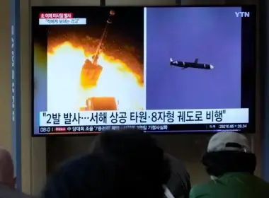 A TV shows images of a North Korean missile launch during a news program at the Seoul Railway Station in Seoul, South Korea, Oct. 13, 2022. AP