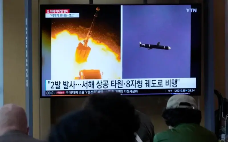 A TV shows images of a North Korean missile launch during a news program at the Seoul Railway Station in Seoul, South Korea, Oct. 13, 2022. AP