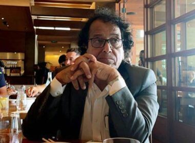 In this photo provided by Ibrahim Almadi, Saad Ibrahim Almadi sits in a restaurant in an unidentified place, in the United States, on August 2021. AP