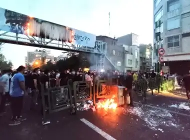 People light a fire during a protest over the death of Mahsa Amini, a woman who died after being arrested by the Islamic republic's "morality police", in Tehran, Iran, September 21, 2022. (photo credit: WANA (WEST ASIA NEWS AGENCY) VIA REUTERS)