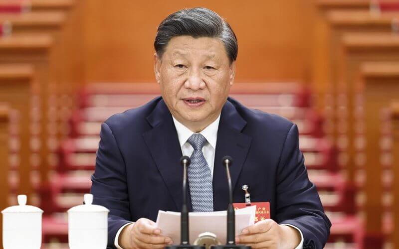In this photo released by Xinhua News Agency, Chinese President Xi Jinping presides over a preparatory meeting ahead of the 20th National Congress of the Communist Party of China held at the Great Hall of the People in Beijing on Saturday, Oct. 15, 2022. AP
