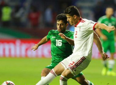 Voria Ghafouri, right, then an Iranian national soccer team player, fights for the ball during the AFC Asian Cup soccer match at the Al Maktoum Stadium in Dubai, United Arab Emirates, Jan. 16, 2019. AP