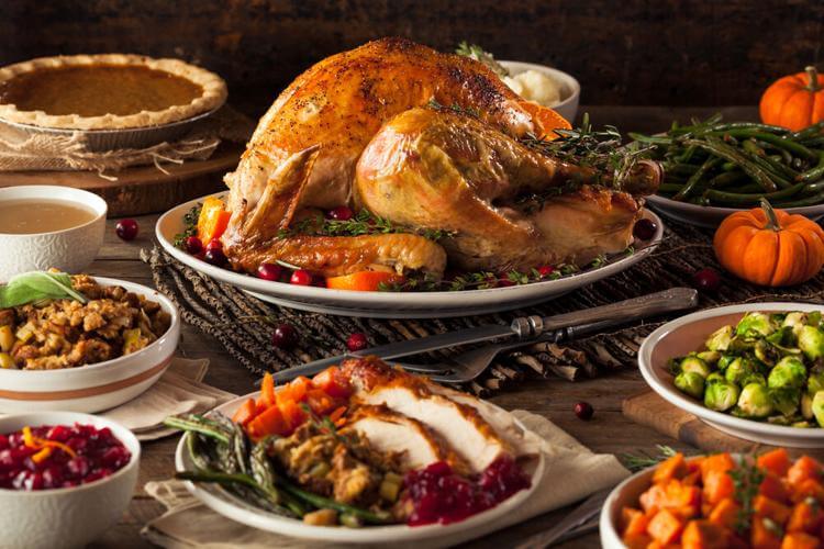 Homemade Thanksgiving turkey with all the sides. Brent Hofacker / Shutterstock.com