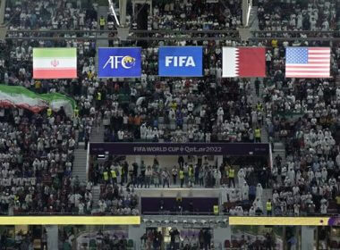 The flags of Iran, left, and the United States, right, hang above the stadium during the World Cup group B soccer match between Iran and the United States at the Al Thumama Stadium in Doha, Qatar, Tuesday, Nov. 29, 2022. (AP Photo/Hassan Ammar)